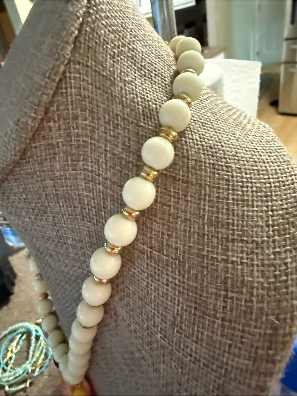 White Beaded Necklace with Gold Accents and Multicolor Swimmer Charms - Picture 6 of 10